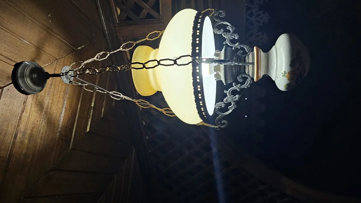 Vintage oil-style pendant lamp on the verandah