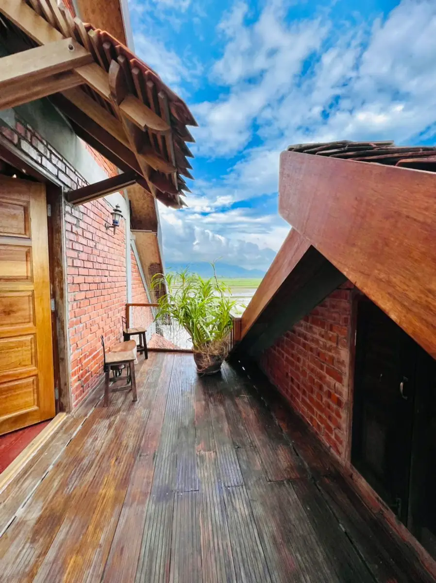 Upstairs balcony deck with a view across the padi fields