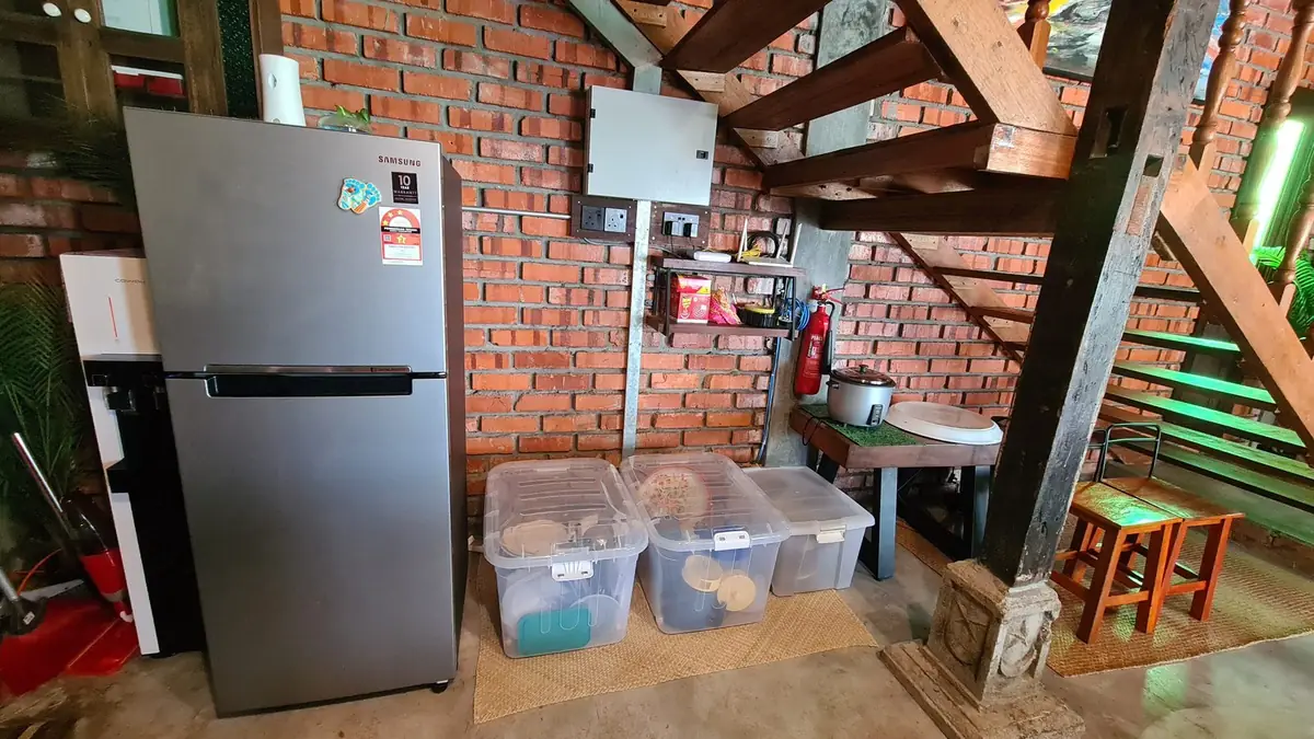 Kitchen corner with fridge, water dispenser and rice cooker