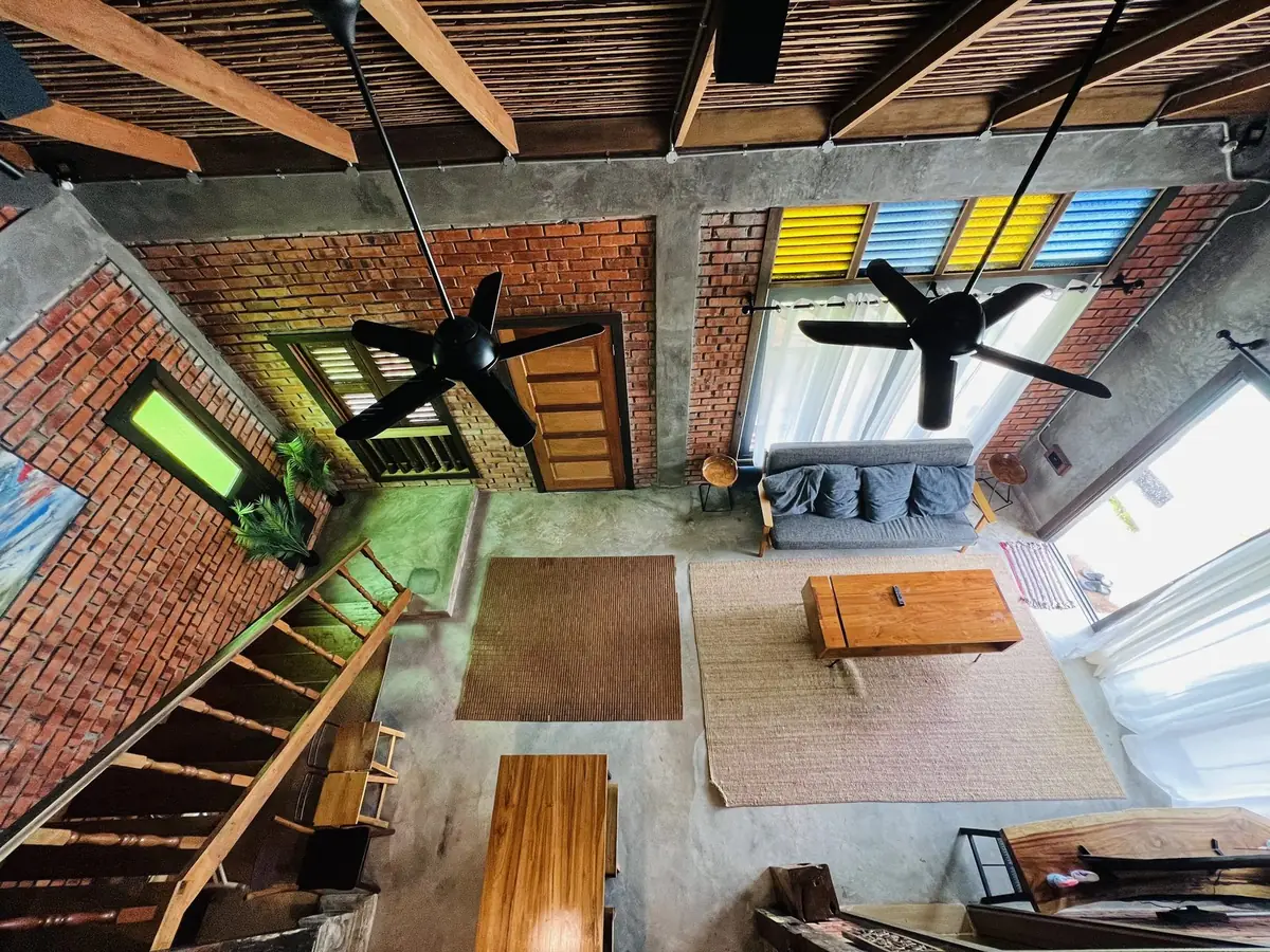 Looking down from the loft into the living hall